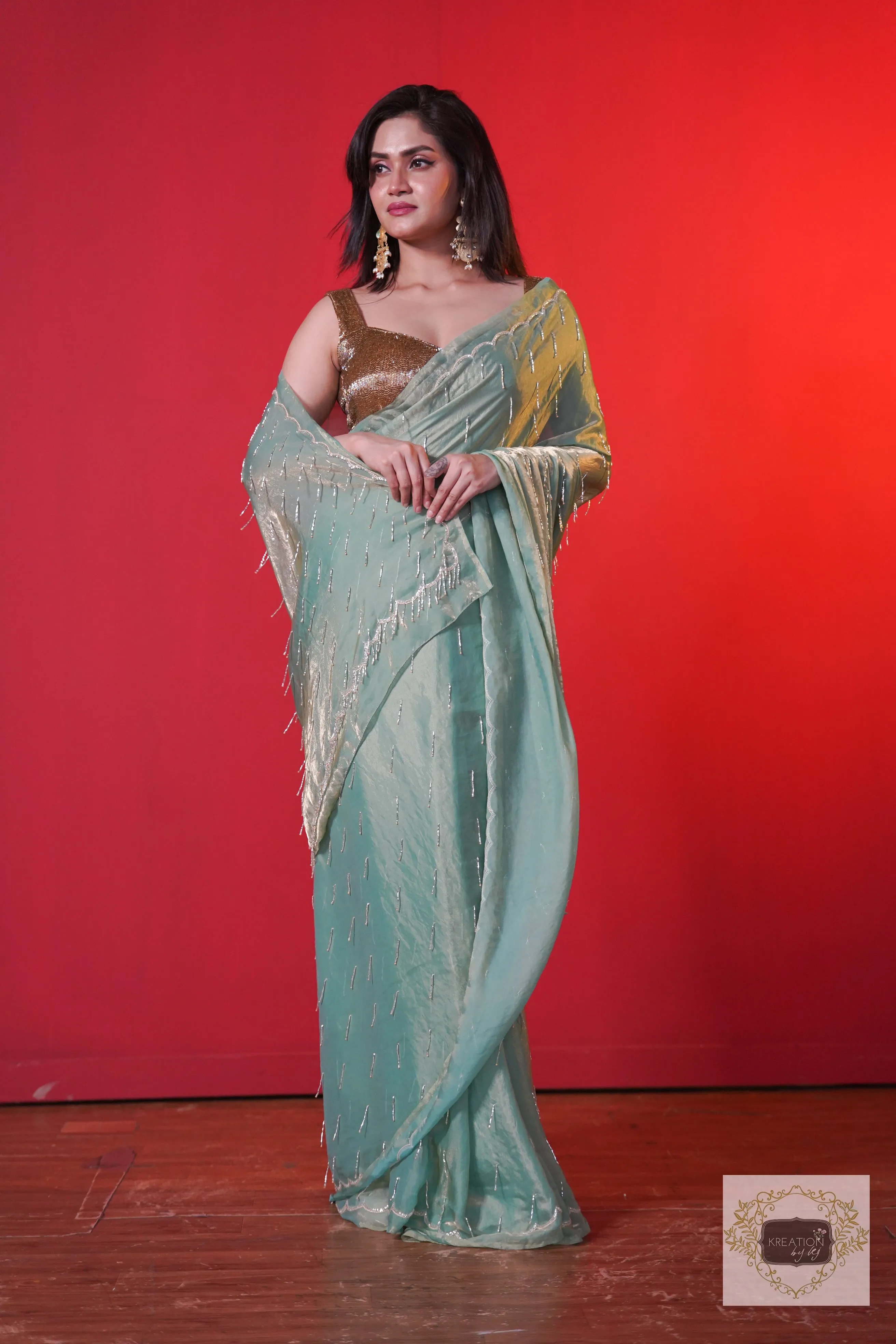 Chammak Challo Pastel Green Shimmer Satin Saree