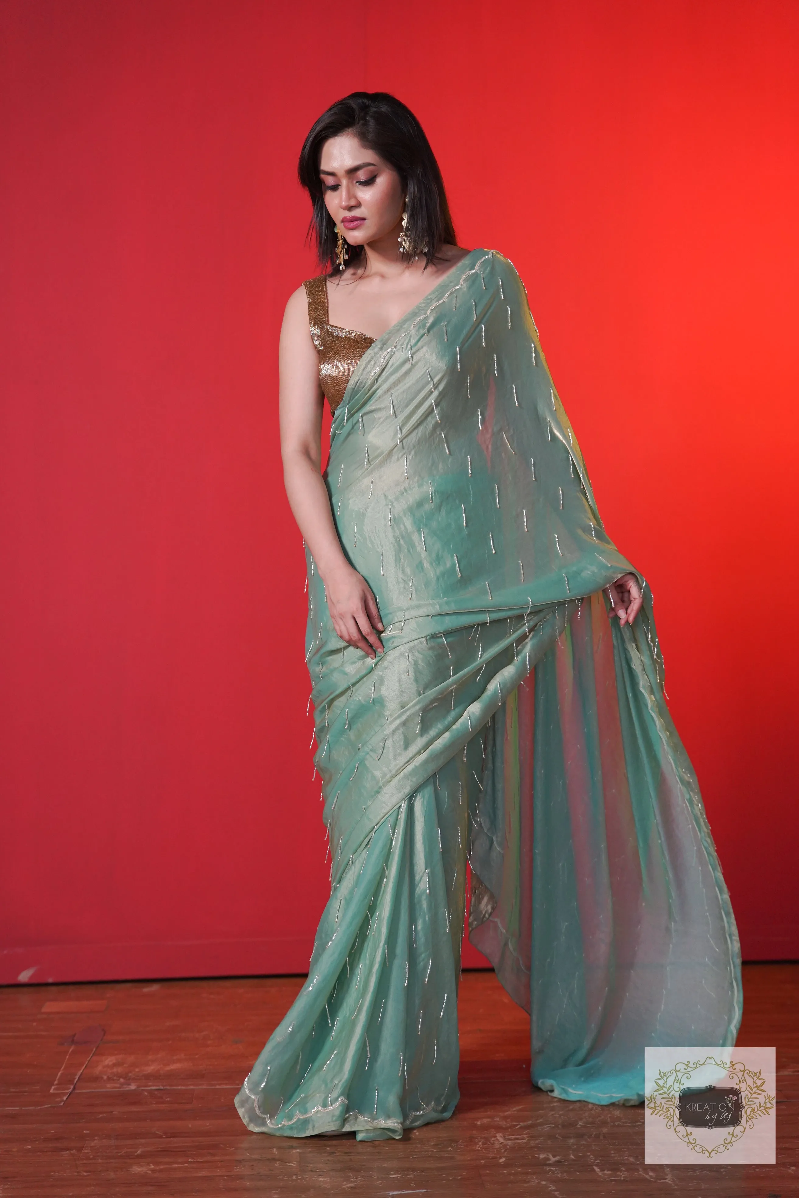 Chammak Challo Pastel Green Shimmer Satin Saree