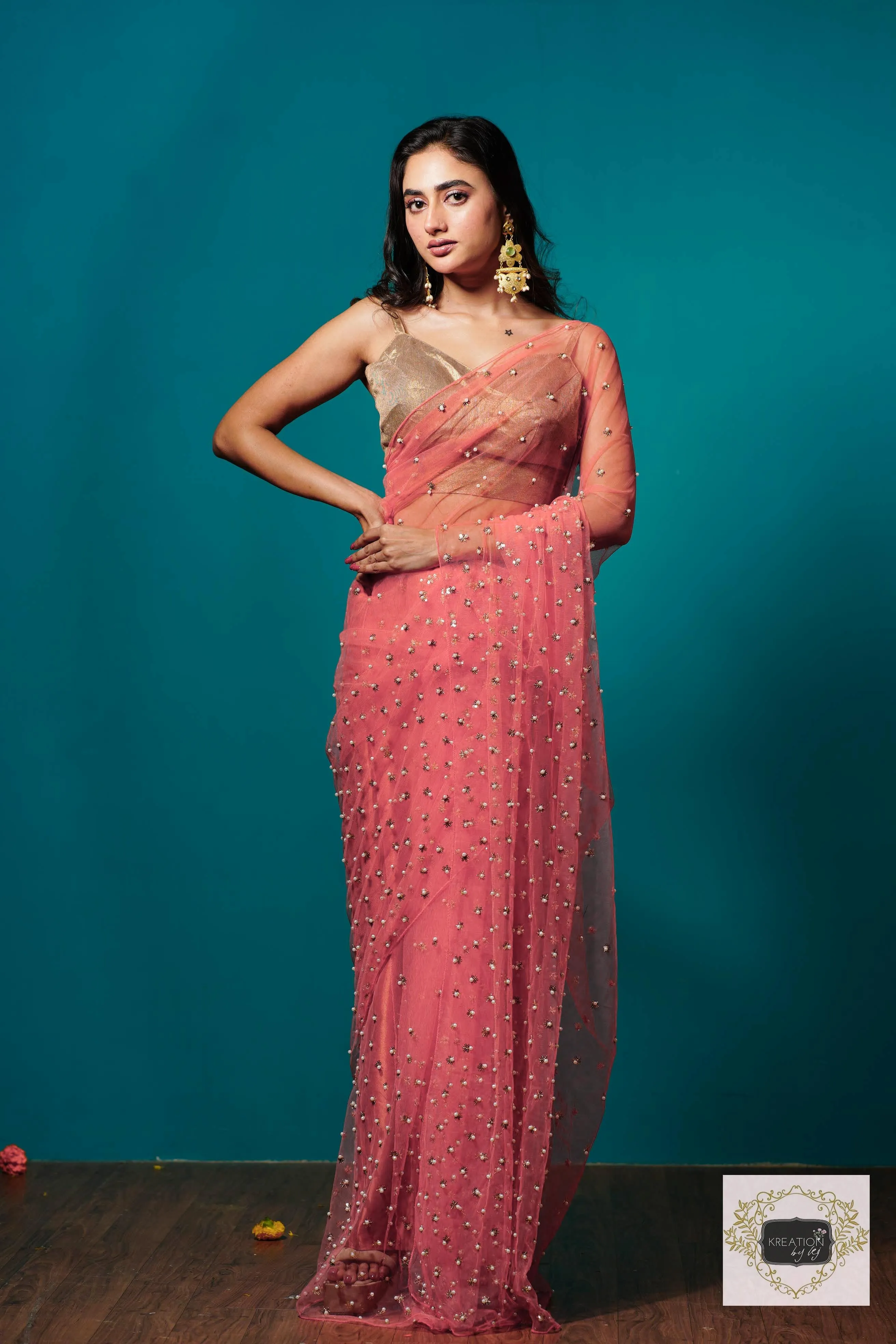 Coral jugnoo net saree