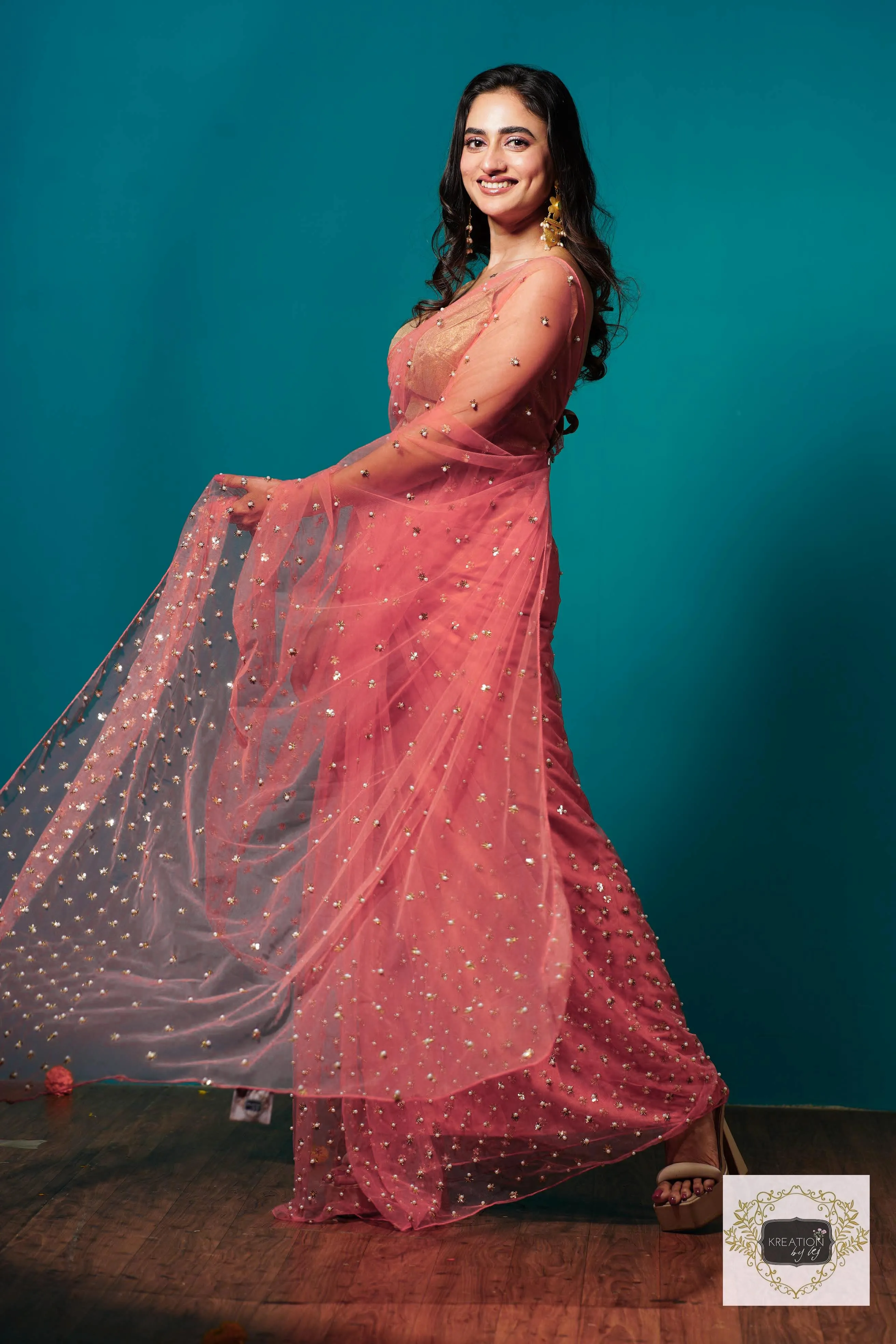 Coral jugnoo net saree