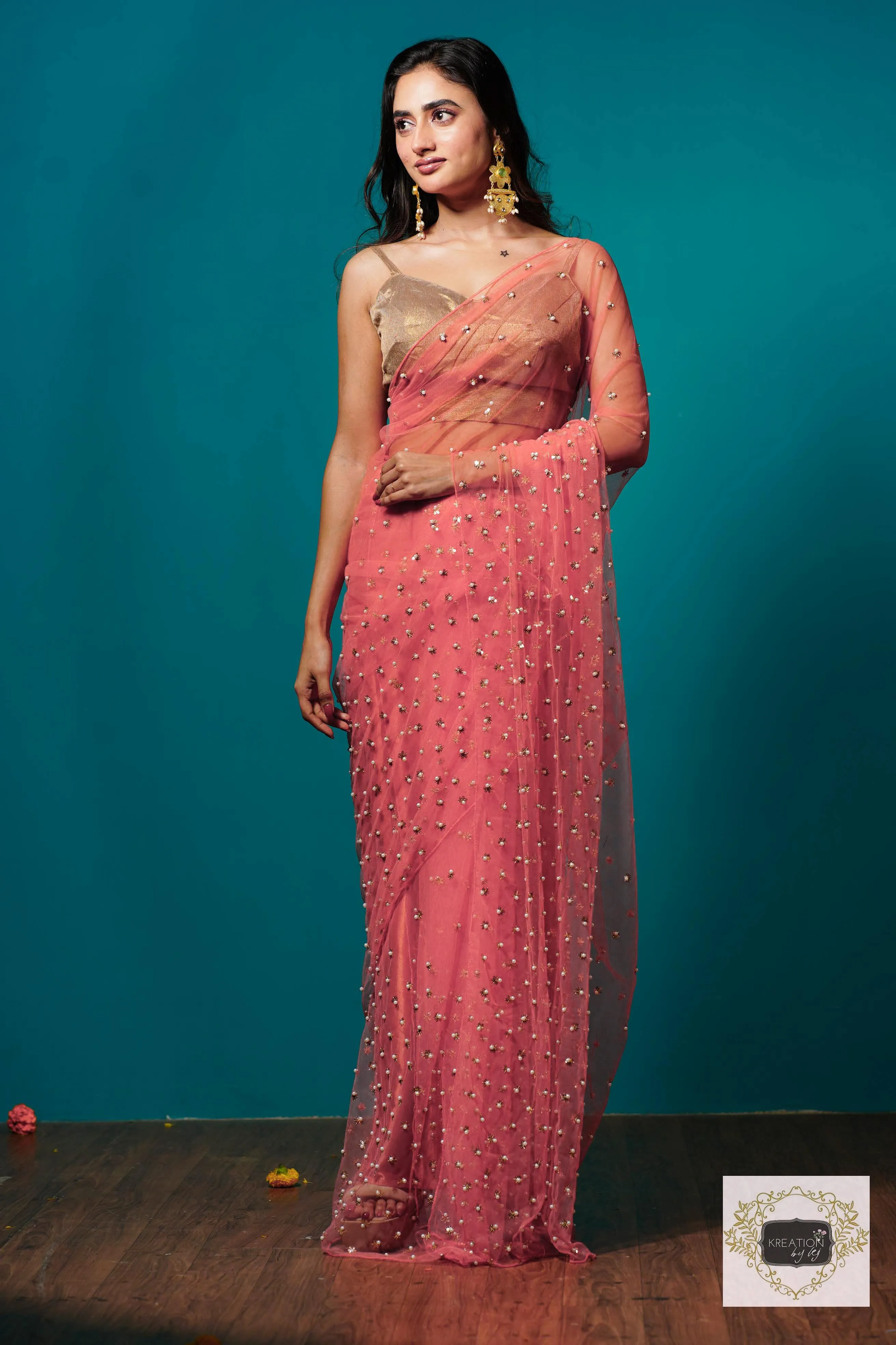 Coral jugnoo net saree