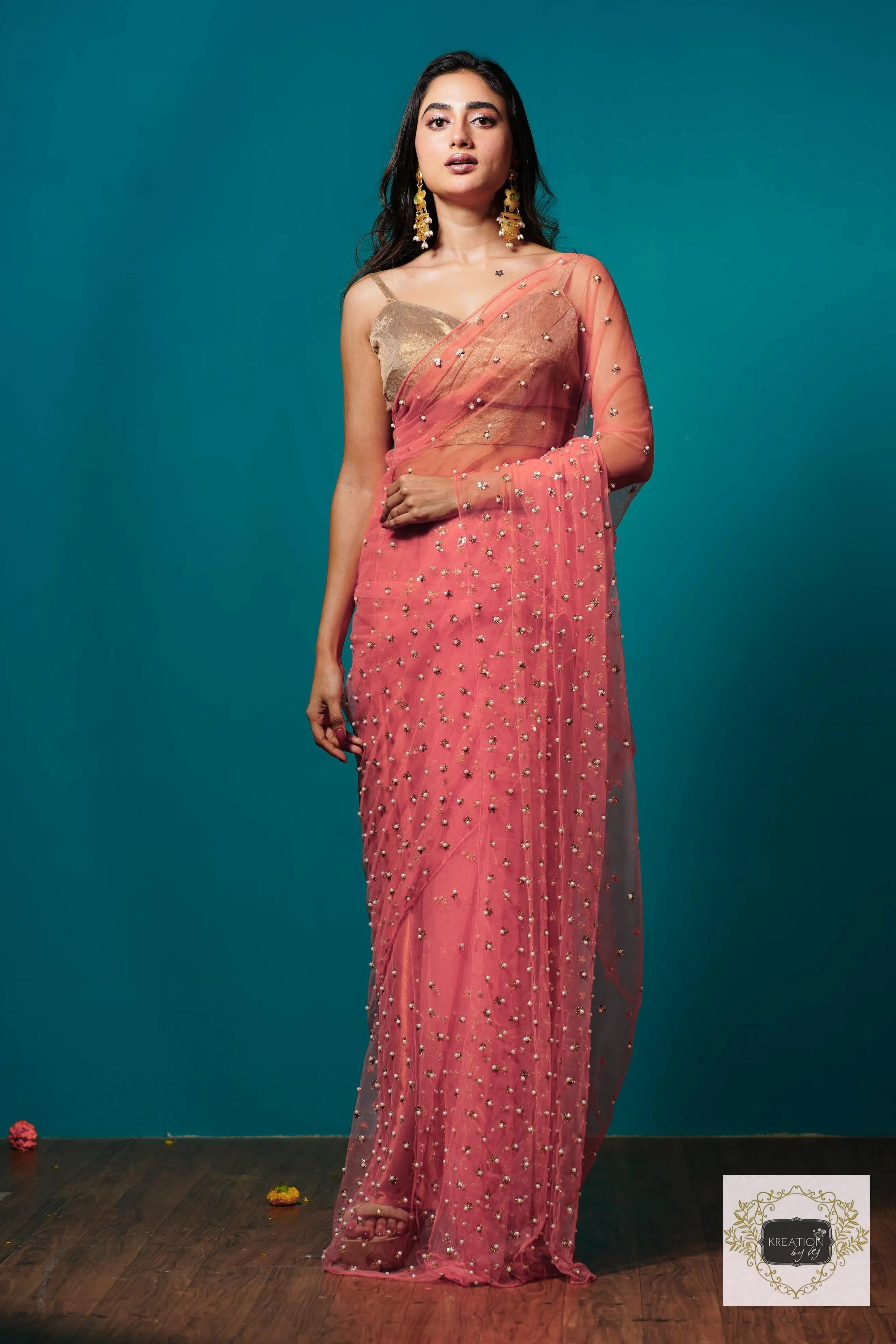 Coral jugnoo net saree