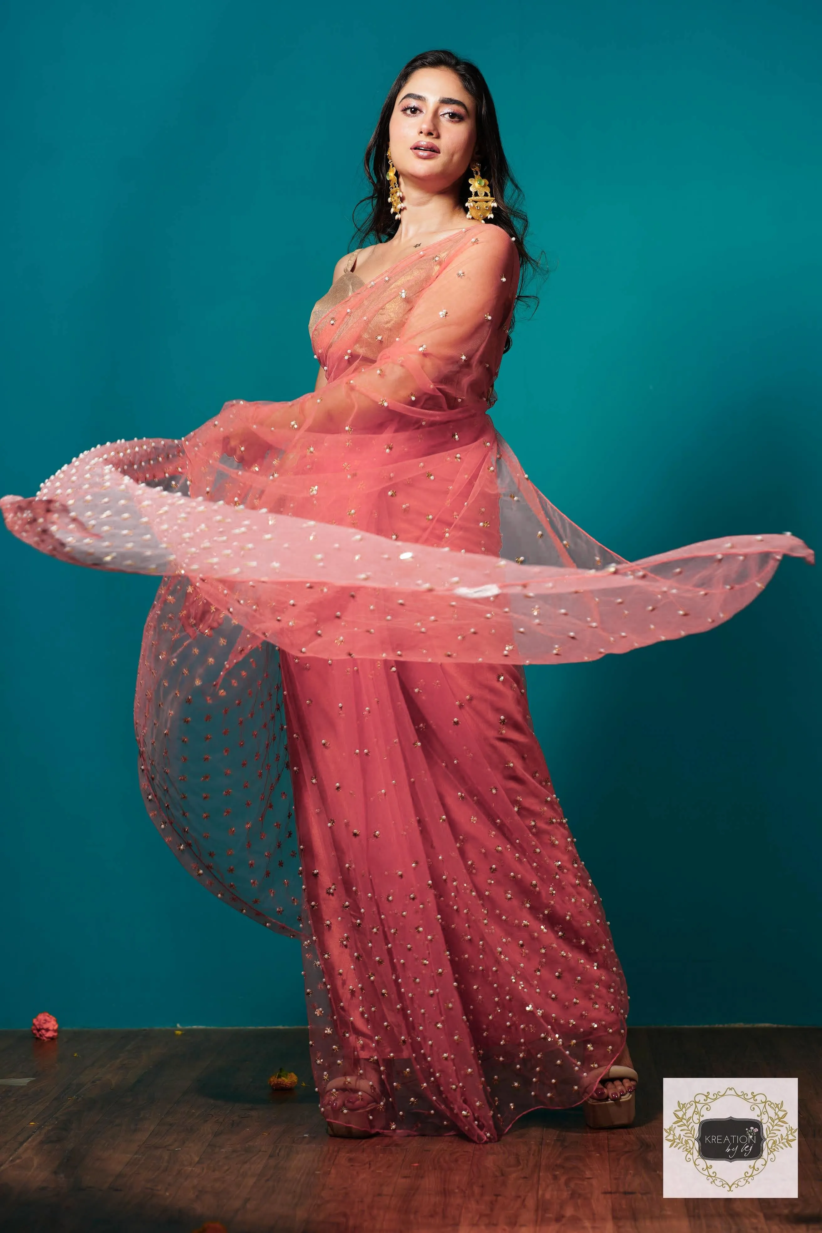 Coral jugnoo net saree