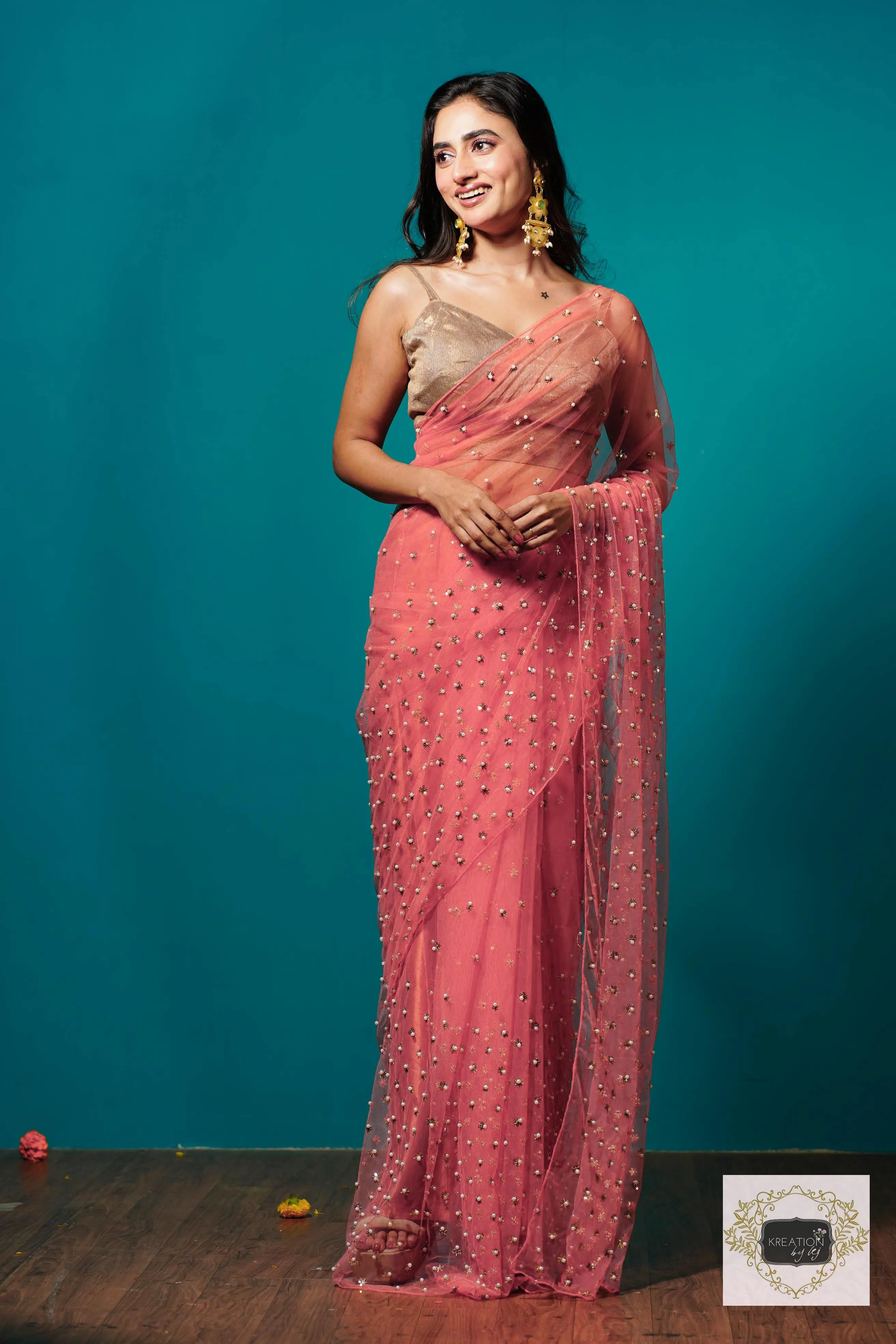 Coral jugnoo net saree