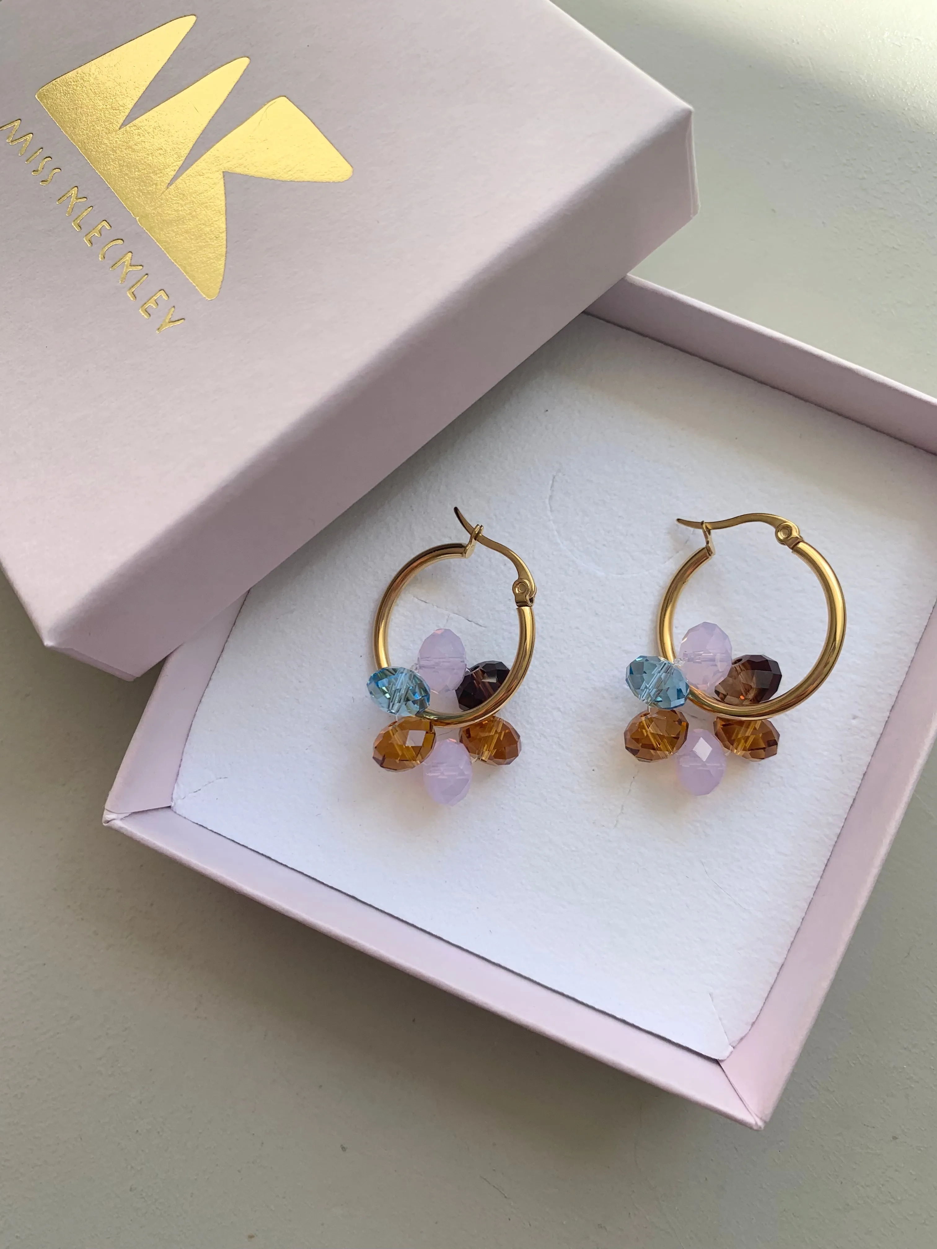 SWAROVSKI FLOWER GOLD MEDIUM HOOPS